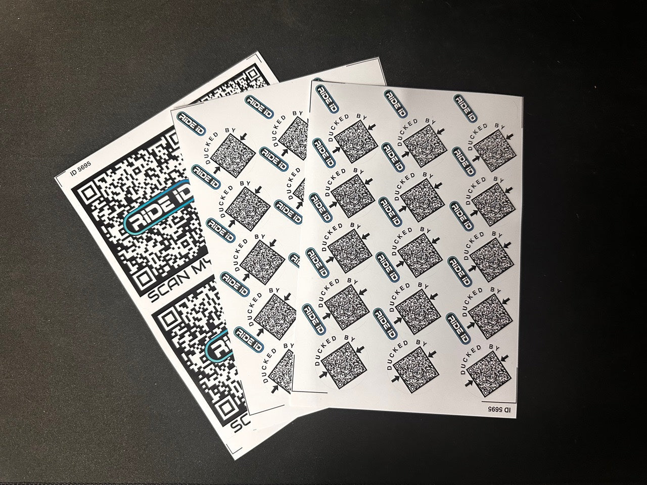 RideID QR code redemption sticker set with three sheets totaling 30 Duck Tags