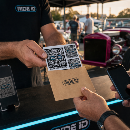 RideID QR redemption gift set being handed to a new member at a car show
