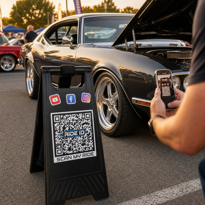 RideID Scan Stand beside a vehicle at a car show with a large scannable QR display
